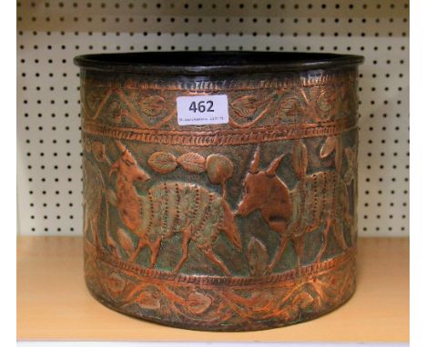 An Eastern hammered copper planter, H. 21cm.