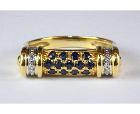 A yellow metal (tested high carat gold) sapphire and diamond ring (L).