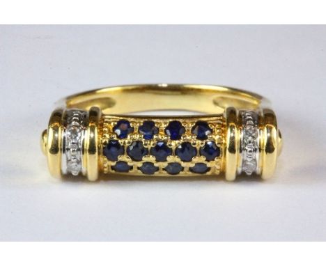 A yellow metal (tested high carat gold) sapphire and diamond ring (L).