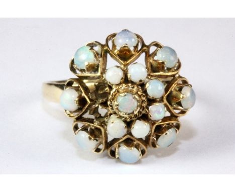 A 9ct yellow gold opal cluster ring (2 stones missing), (R).