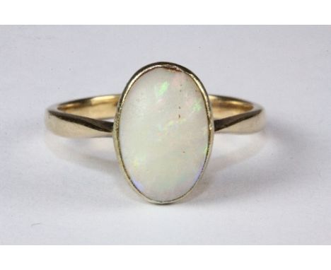 A 9ct gold and opal set ring, (O.5).