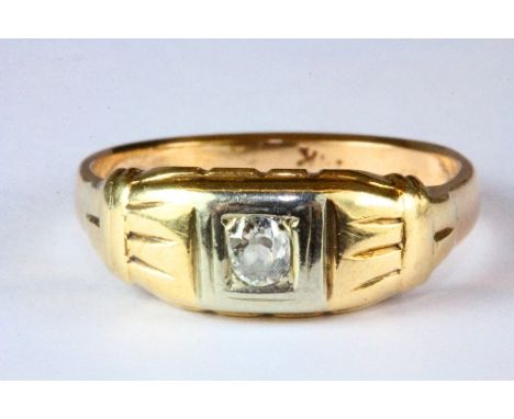 A yellow metal (worn hallmarked but tested gold) gents diamond solitaire ring (U.5).