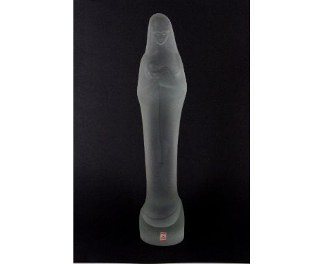 A Dutch crystal glass figure of the Madonna and child with its original box and label. H. 30 cm. Provenance : G. Light collec