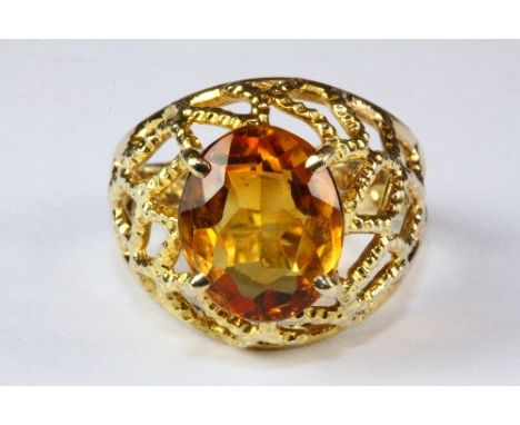 A 9ct gold and large citrine ring, (Q).