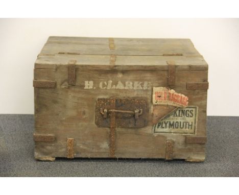 A metal bound pine trunk, 65cm x 65cm x 38cm.