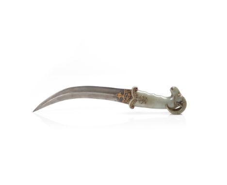 A Mughal-style dagger Jade hilt, carved with a ram's head finial, decorated with inlaid cabochon quartz stones with red backi