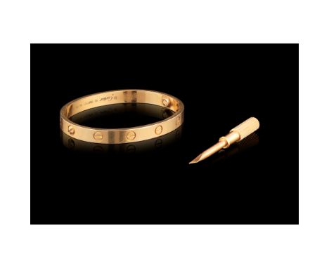 A CARTIER bangle, LOVE collection Gold 750/000Chased decorationSwitzerland21st centuryConvention assay warrantee mark, signed