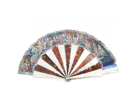 A fan White and dyed ivory, mother-of-pearl, sandalwood and turtle shell pierced and reliefs guards and sticks, featuring lan