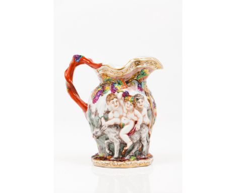 A jug Italian Capodimonte porcelainBacchus with fauns decorationTree trunk shaped handleMarked to base19th / 20th century(res