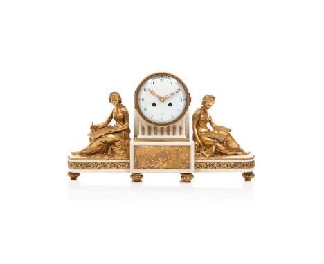 A Louis XVI-style mantel clock In white marble with chiselled gilded bronze applicationsBase decorated with a floral frieze a