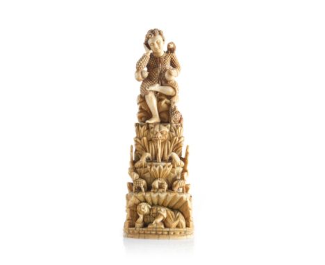The Child Jesus as The Good Shepherd Indo-Portuguese ivory sculpture portraying the reclining Child Jesus attired in a sheep 
