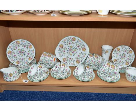 A QUANTITY OF MINTON HADDON HALL PATTERN TEAWARES, ETC, comprising a bread and butter plate, a milk jug, a sugar bowl, diamet