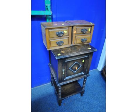 AN EARLY 20th CENTURY SMOKERS CUPBOARD with single door enclosing a fitted interior, over bobbin turned legs and undershelf a