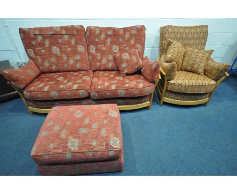 AN ERCOL RENAISSANCE TWO PIECE SUITE comprising  a two seat settee, width 194cm, and an armchair, width 86cm with similar uph