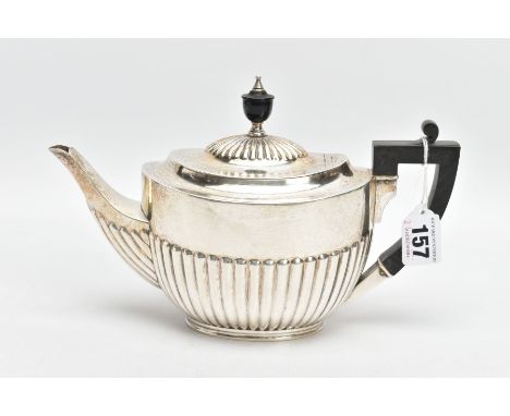 A SILVER TEAPOT, tapered stop reeded design, fitted with a black wooden handle and finial, hallmarked 'William Hutton &amp; S