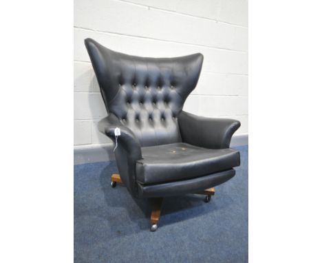 A G PLAN MODEL 6250 BLACK LEATHER WING BACK ARMCHAIR, on rosewood effect legs, on casters, unlabelled (condition:-cracked lef