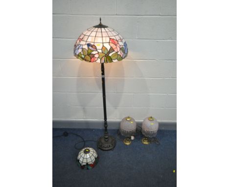 A TIFFANY STYLE STANDARD LAMP, height 153cm, tiffany style lamp shade and a pair of brassed table lamps (4)