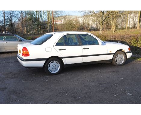 A 1995 MERCEDES C180 CLASSIC FOUR DOOR SALOON CAR IN WHITE 1.8 litre petrol engine 5 speed manual gearbox, no V5C but we have