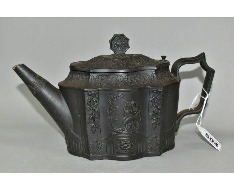 AN EARLY NINETEENTH CENTURY BLACK BASALT TEAPOT, with octagonal finial bearing a sun motif on a hinged lid, shaped body decor
