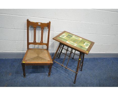 AN EARLY 20th CENTURY MAHOGANY OCCASSIONAL TABLE with floral tilled top tapered round legs with bobbin intersections, width 5
