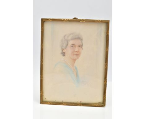 A SMALL PORTRAIT AND BRASS FRAME, a portrait of an elderly lady wearing a double strand of pearls, signed Hwen Ramsay 39, sec