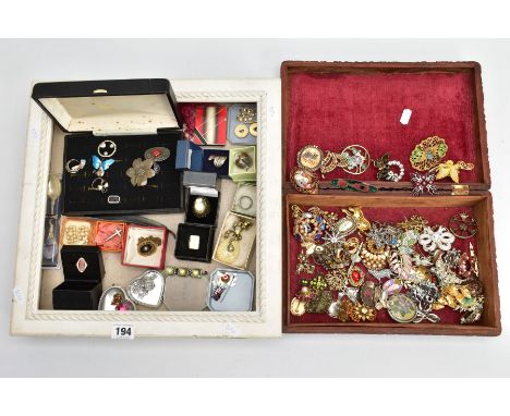 A WOODEN BOX AND A DISPLAY BOX WITH CONTENTS OF JEWELLERY, mostly costume jewellery pieces to include a white metal rings, pe