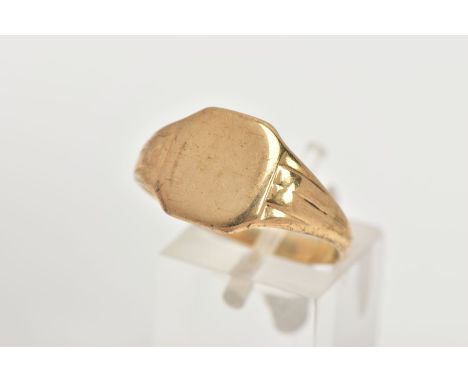 A 9CT GOLD SIGNET RING, of a plain square form, tapered  shoulders, approximate face dimensions 11mm x 12mm, hallmarked 9ct g