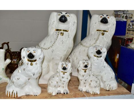 SIX BESWICK OLD ENGLISH DOGS, white and gilt, model nos. 1378-1 (both left facing), 1378-5 and 1378-6 (different heights), im