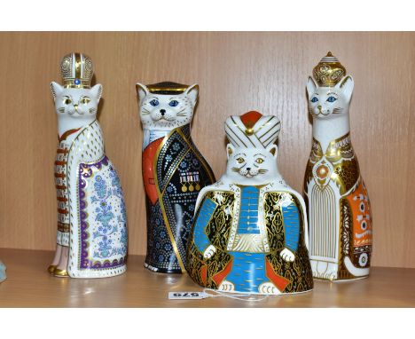 FOUR ROYAL CROWN DERBY 'ROYAL CATS' PAPERWEIGHTS, comprising 'Persian', a second but with gold button, 'Pearly King', no butt