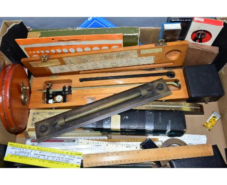 A BOX CONTAINING A GERMAN SHIPS BAROMETER, MODEL 9362 TYPE 104 IN WOODEN BOX, a brass rolling parallel rule, a curved wood an