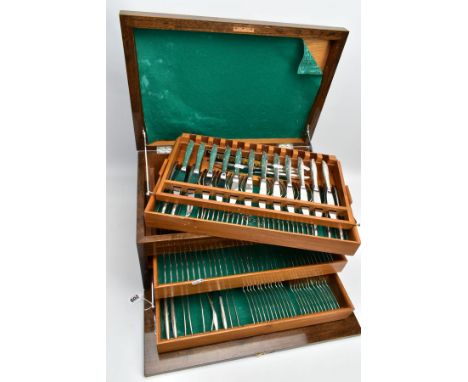 A WOODEN CANTEEN OF 'COMMUNITY' CUTLERY, wooden canteen opens to reveal three teirs complete with 'Community' signed cutlery,