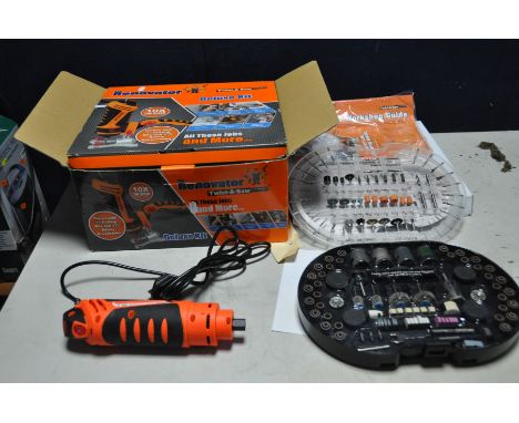 A BOXED AND BARELY USED 'THE RENOVATOR' ROTARY TOOL with accessories, DVD and manuals (PAT pass and working)