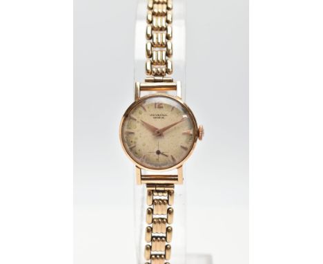 A LADYS 18CT GOLD 'UNIVERSAL GENEVE' WRISTWATCH, hand wound movement, round discoloured silver dial signed 'Universal Geneve'