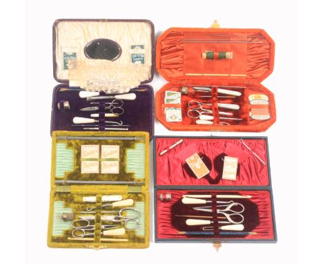Four late 19th century/ early 20th century sewing companions two covered in plush, two in leatherette, all with a selection o