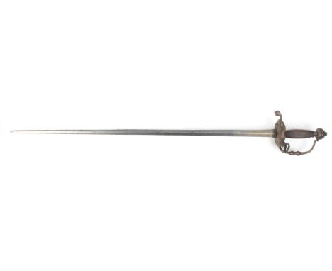 A 17th Century officers sword or walloon, 81cm, flattened diamond section blade reduced at the tip, characteristic side guard