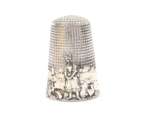 A French silver fable thimble 'The broken pitcher', stamped 'France'
