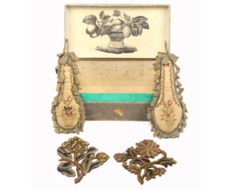 A pair of wool work embroidered floral slips and a pair of silk wall hangings, the pair of slips each as a flower and leaves 
