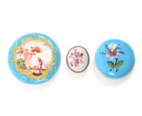 Buttons - three 18th Century enamel buttons, probably English comprising an example painted with a man in an open landscape, 