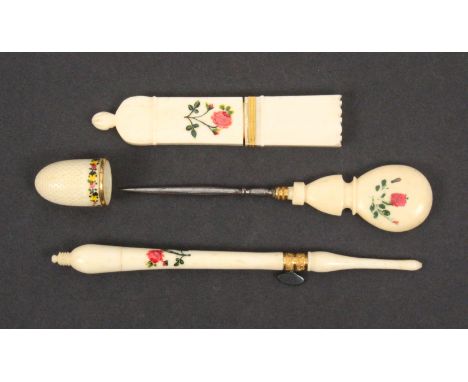 A good set of floral painted French ivory sewing tools, circa. 1830, comprising a quiver form needle case, 7.7cm., a stiletto