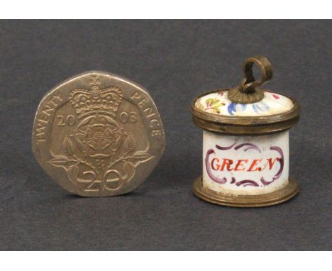 An unusual late 18th Century English enamel miniature tea caddy presumably for a doll, of oval form, the white enamel decorat