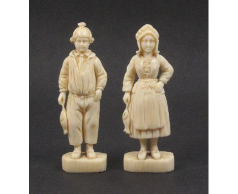 A pair of 19th Century well carved Dieppe ivory figures of a fisherman and companion, in traditional costume each holding a r