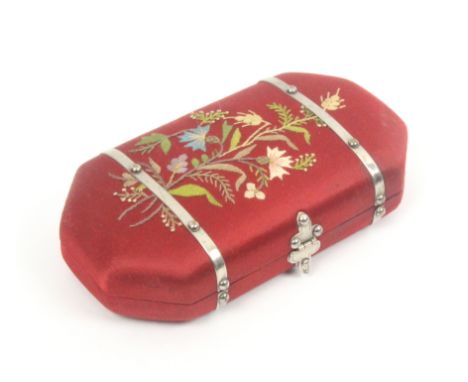 An attractive late Victorian sewing companion of canted corner rectangular form with metal mounts and catch, covered in plum 