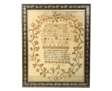 An attractive late 18th Century sampler in a decorative frame by 'Sarah Bowmar' worked with alphabets and numerals, crowns an