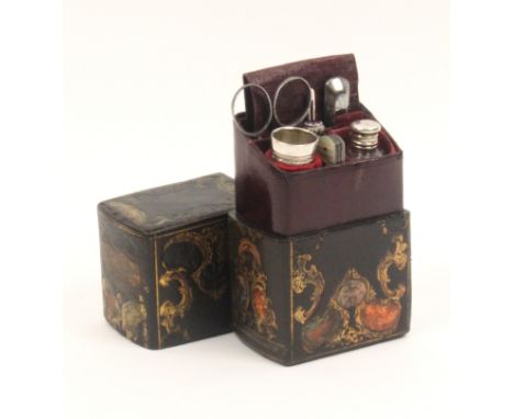 A 'Ladys Companion' leather book form sewing companion the red morocco case tooled and titled to the spine and stamped 'W Lun