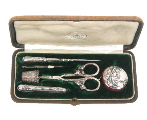 An early 20th Century Italian etui, the rectangular case covered in grained leather, the silk and velvet interior with a prin