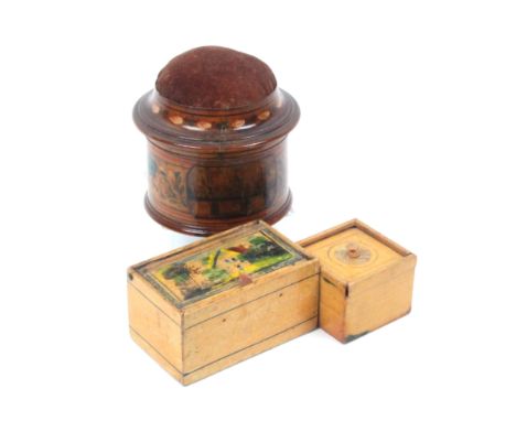 An early 19th painted Tunbridge ware circular box with  domed pin cushion to lid, ring painted and a painted with flowers and