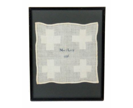 A darning sampler 'Mary Lacy 1796', in white with four variant cross form panels, 21cm sq, glazed and framed.