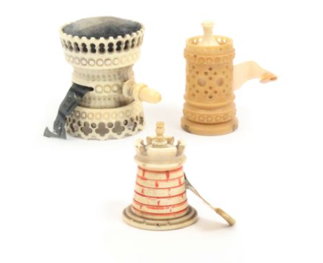 Three tape measures comprising a combination pin cushion example in ivory with pierced and engine turned decoration of waiste