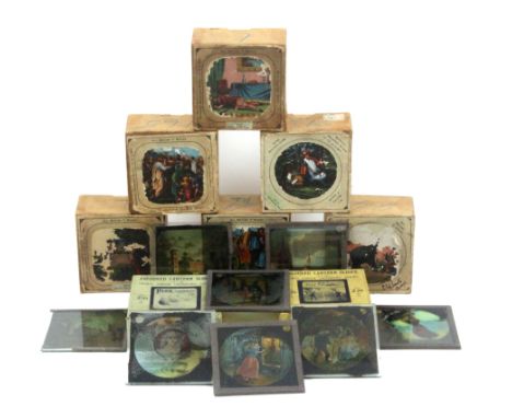 A tin 'Magic Lantern' and a selection of slides  comprising 'All British T Series' - Cinderella (12) / New Testament Series 2