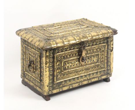 An 18th Century Zanzibar teak casket covered in decorative brass ware, ring side handles, brass latch, the back with a trelli
